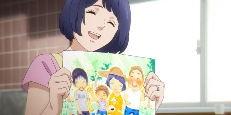 Mẹ của Mirai bên bức tranh gia đình